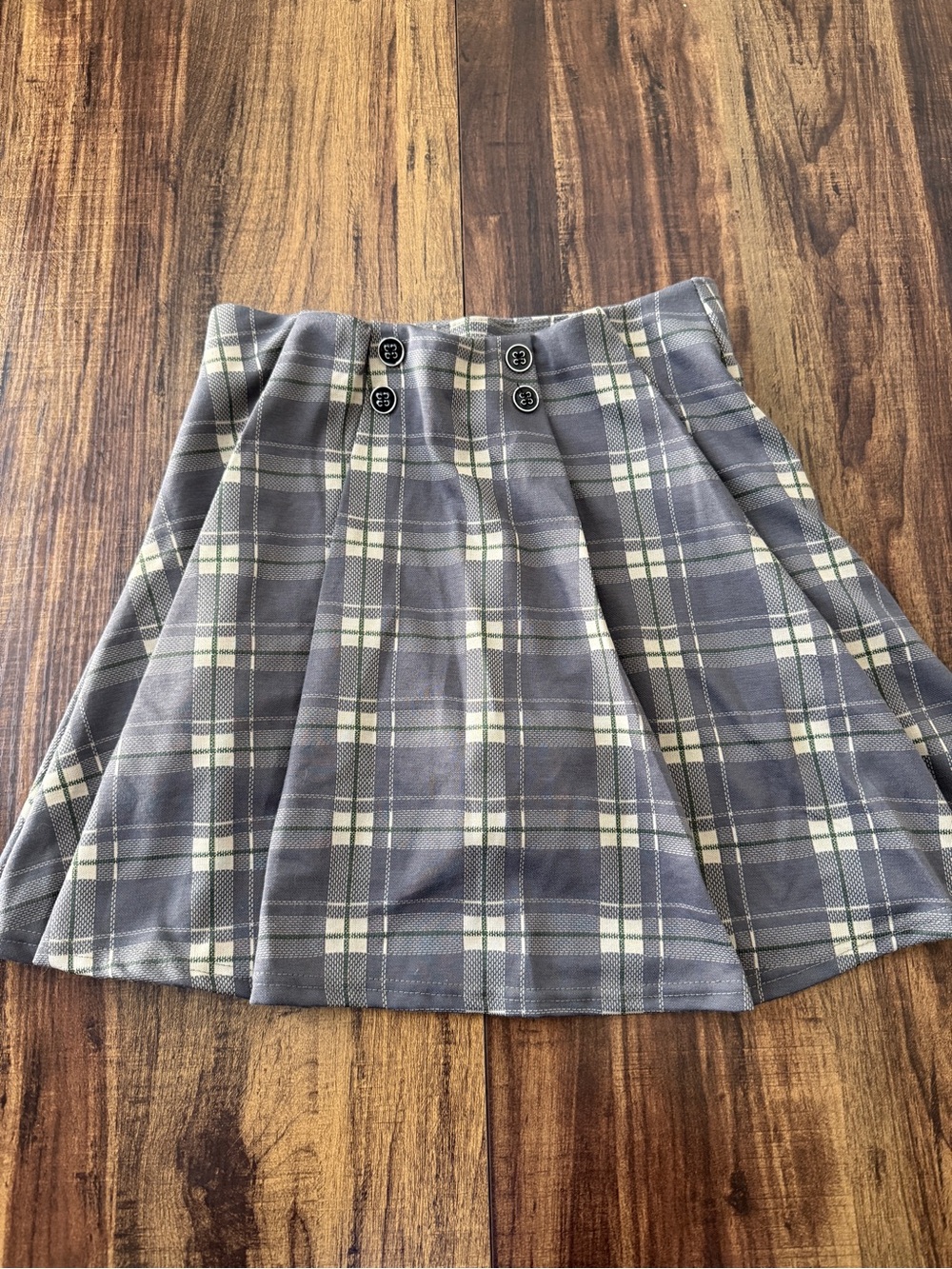 Plaid Pleated skort in Tan and Cream. Skirt with shorts